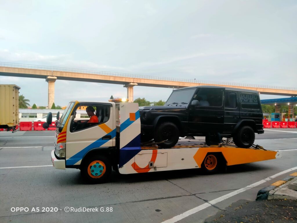 pengiriman mobil ke bengkel langganan